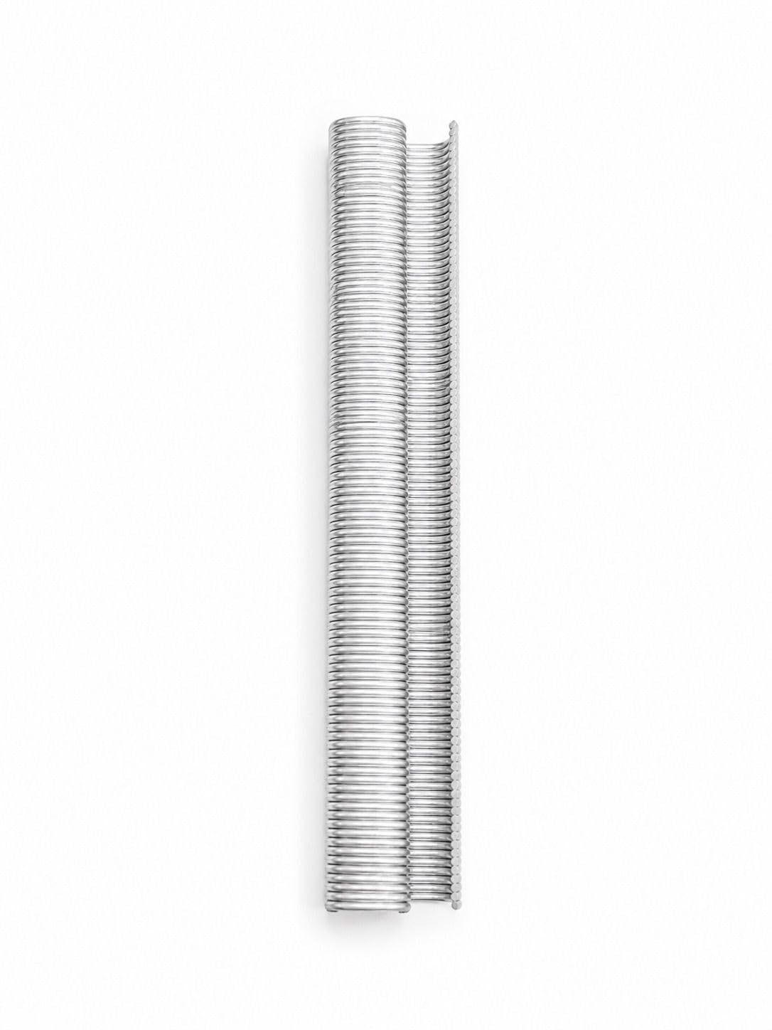 Stack of silver C-ring staples for hog ring tool