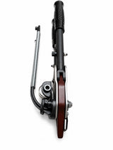 Hog ring tool with black handle, red-brown lever, and metal spring
