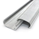 Silver metal hog rings with visible inner coils at the roll ends