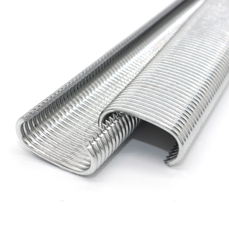Silver metal hog rings with visible inner coils at the roll ends