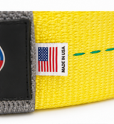 Yellow strap with gray edge and small Made in USA flag patch