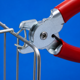 Crimping tool applying a metal hog ring clip, silver U-shaped