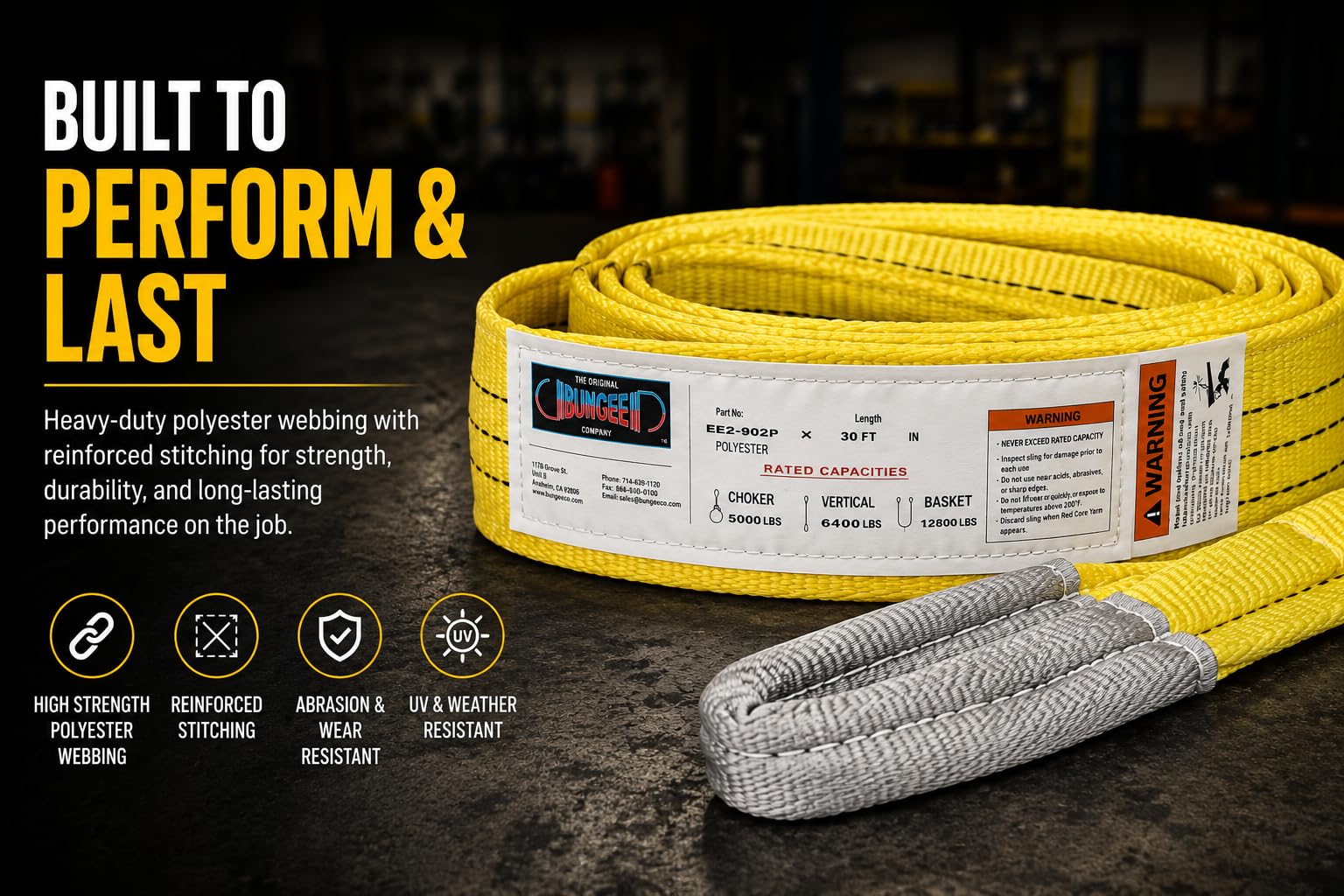 Yellow polyester web sling with white tag and gray cordura-covered eye on folded web