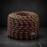 Bungee rope spool with orange-and-black braided elastic cord; premium USA-made label