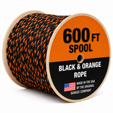600 ft spool of black and orange bungee rope on wooden reel