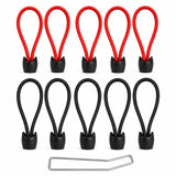 Red and black trampoline bungee cords with capped ends plus metal tool