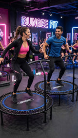 Group workout with Bungee Fit trampolines in a fitness studio.
