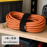 1 inch by 18 inch black cinch strap with zinc-plated buckle organizing an extension cord